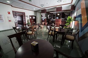 Hotel La Familia Gallo Rojo
