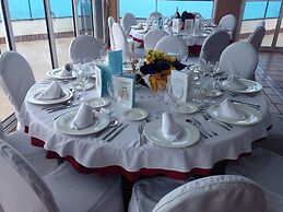 Hotel La Familia Gallo Rojo