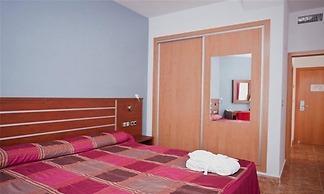 Hotel La Familia Gallo Rojo