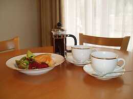 Carlyle Suites & Apartments