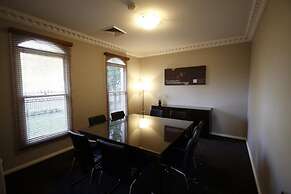 Carlyle Suites & Apartments