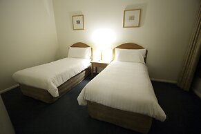 Carlyle Suites & Apartments