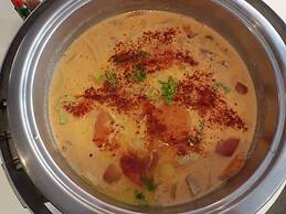 Boss Suites Nana Hotel