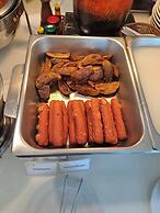 Boss Suites Nana Hotel