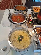 Boss Suites Nana Hotel