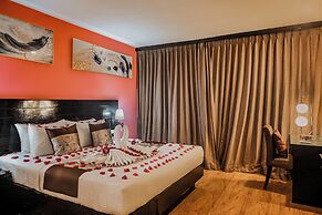 Boss Suites Nana Hotel