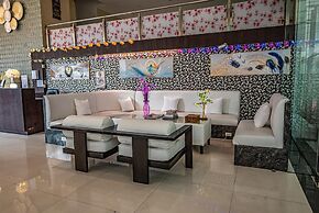 Boss Suites Nana Hotel