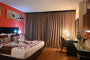 Boss Suites Nana Hotel