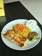 Boss Suites Nana Hotel