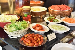 Boss Suites Nana Hotel