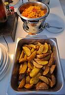 Boss Suites Nana Hotel