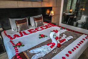 Boss Suites Nana Hotel