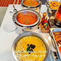 Boss Suites Nana Hotel