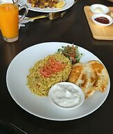 Boss Suites Nana Hotel