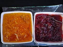 Boss Suites Nana Hotel