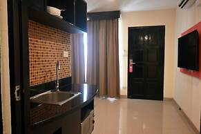 Boss Suites Nana Hotel