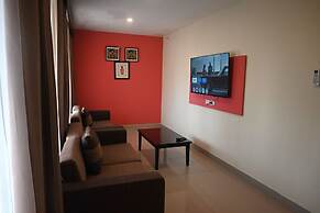 Boss Suites Nana Hotel