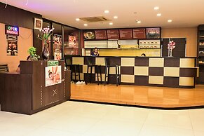 Boss Suites Nana Hotel