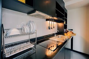 Golden Tulip Mandison Suites