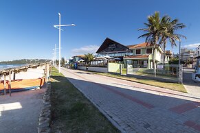 Aluguel Casa 4 quartos 1 suite frente mar 016