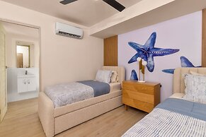 Surfside Beachfront Suites by Playa Caracol Resorts