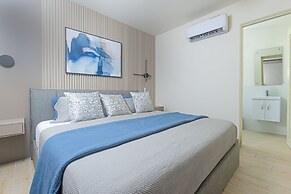 Surfside Beachfront Suites by Playa Caracol Resorts