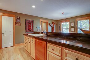 Wanderlust Elegant Townhome includes Rustic Stone Fireplace by RedAwni