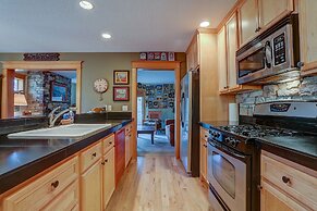 Wanderlust Elegant Townhome includes Rustic Stone Fireplace by RedAwni