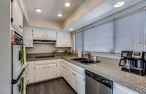 Poolside Living 4 Bedroom Home by RedAwning