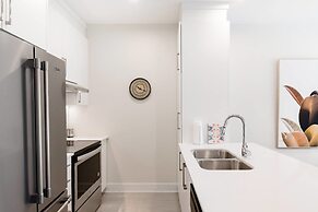 Discover Little Italy From a Bright Apartment