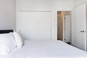 Discover Little Italy From a Bright Apartment