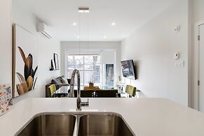 Discover Little Italy From a Bright Apartment