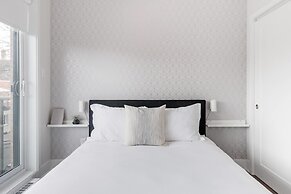 Discover Little Italy From a Bright Apartment