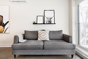 Discover Little Italy From a Bright Apartment