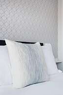 Discover Little Italy From a Bright Apartment