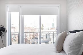 Discover Little Italy From a Bright Apartment