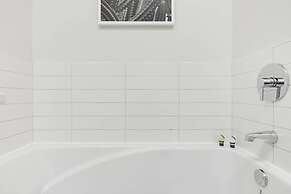 Discover Little Italy From a Bright Apartment