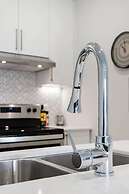 Discover Little Italy From a Bright Apartment