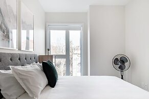 Discover Little Italy From a Bright Apartment