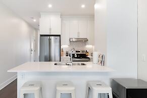 Discover Little Italy From a Bright Apartment