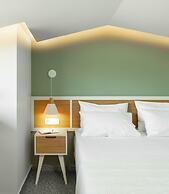 Eco Green Residences & Suites