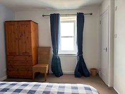 Petfriendly-beachfront-sunsetfacingsunporch-garden