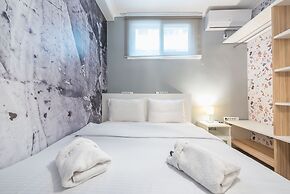 Welcoming Koukaki Home  by Cloudkeys