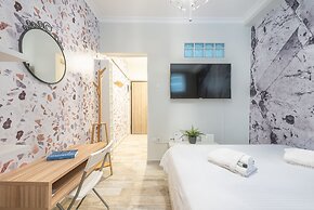 Welcoming Koukaki Home  by Cloudkeys