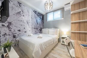 Welcoming Koukaki Home  by Cloudkeys