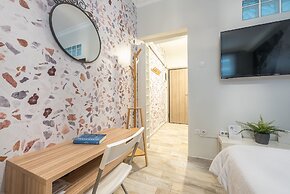 Welcoming Koukaki Home  by Cloudkeys