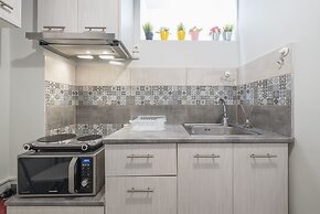 Welcoming Koukaki Home  by Cloudkeys