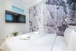 Welcoming Koukaki Home  by Cloudkeys