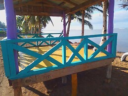 Sina PJ Beach Fales and Surf