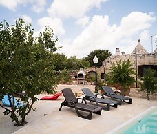 Trullo Paan Pascarosa Ostuni by Typney